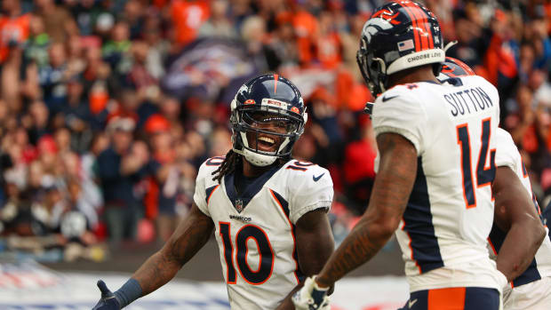Oct 30, 2022; London, United Kingdom, Denver Broncos wide receiver Jerry Jeudy (10) is congratulated by wide receiver Courtland Sutton (14) after scoring a touchdown against the Jacksonville Jaguars in the second quarter during an NFL International Series game at Wembley Stadium. Mandatory Credit: Nathan Ray Seebeck-USA TODAY Sports